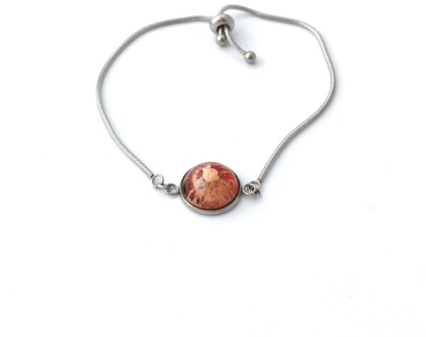 Autumn colored resin dome on stainless steel bracelet