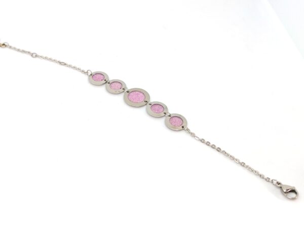 Light pink resin bubble on stainless steel bracelet