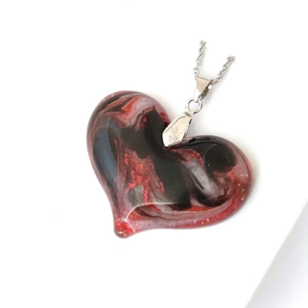 Rippled silk, red, black and silver color resin heart pendant