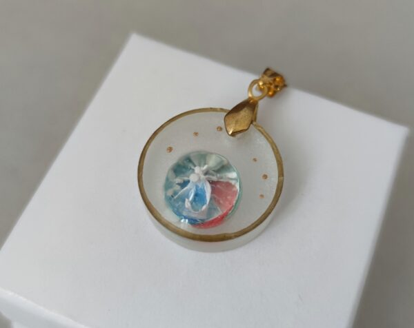 Rainbow planet, resin round pendant with gold edges