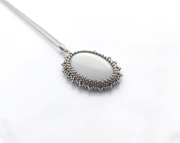 White-nickel bubble, beaded pendant