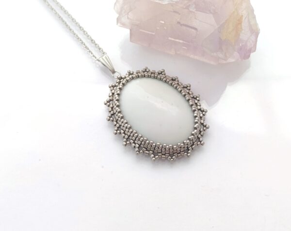 White-nickel bubble, beaded pendant