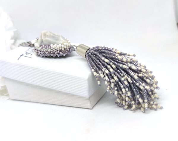 Iceberg pendant with silver and white color beadtassel