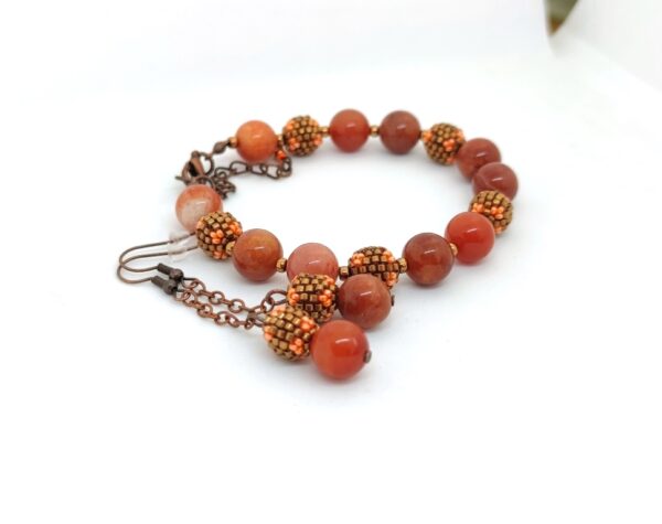 Set of bracelet and earrings with topaz jade gemstones and beaded beads