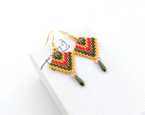 Arrow beaded earrings in jamaican colors