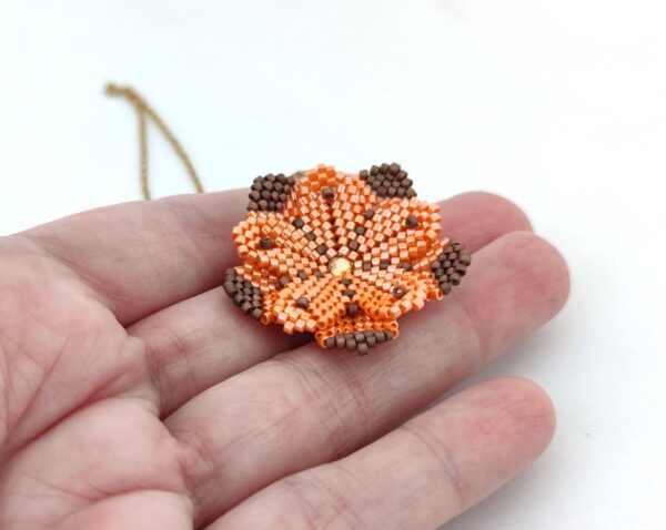 Marigold flower, beaded pendant