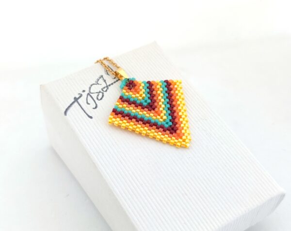 Arrow beaded pendant in mexican colors