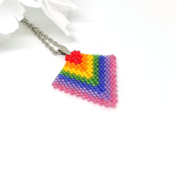 Arrow beaded pendant in strong rainbow colors