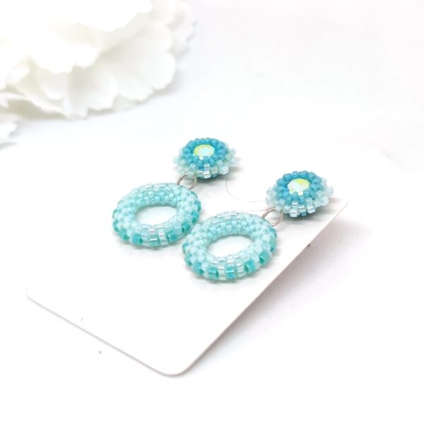 Hoop earrings with chaton studs in turquoise colors