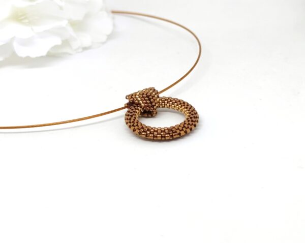 Hoop pendant in bronze and gold colors