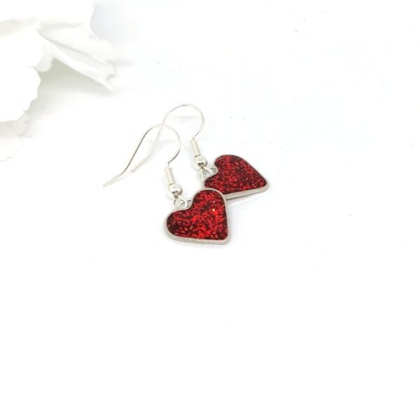 Heart earrings with red glitter