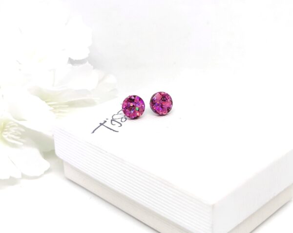 Round, stud earrings with purple, chunky glitter