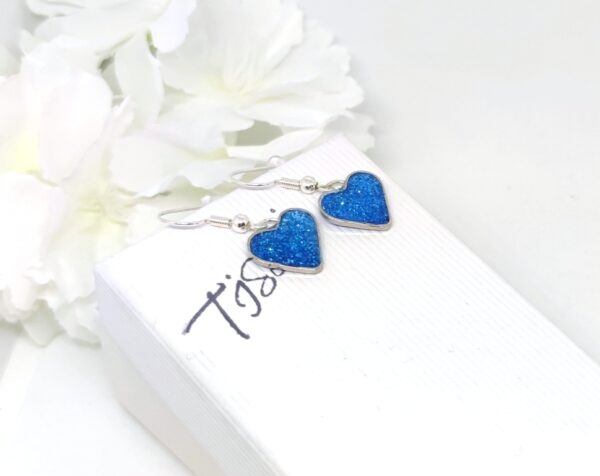 Heart earrings with blue glitter
