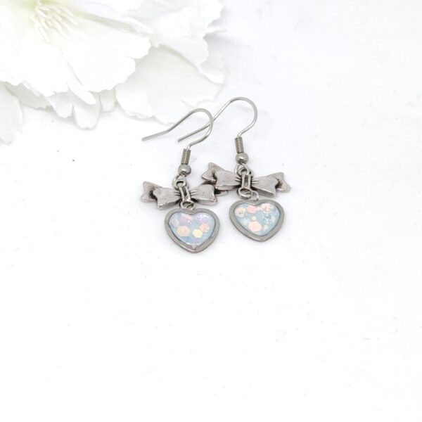 Heart with a bow charm, earrings with white and chunky glitters resin heart
