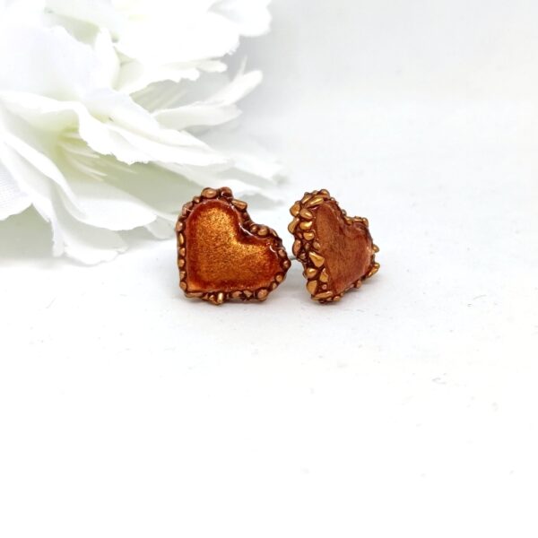 Heart earrings in bronz color with "hagelslag"