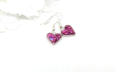 Heart earrings with purple, chunky glitter