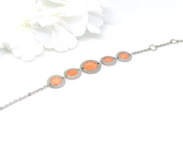 Bubbles with resin in glittery orange color, stainless steel bracelet - Image 2
