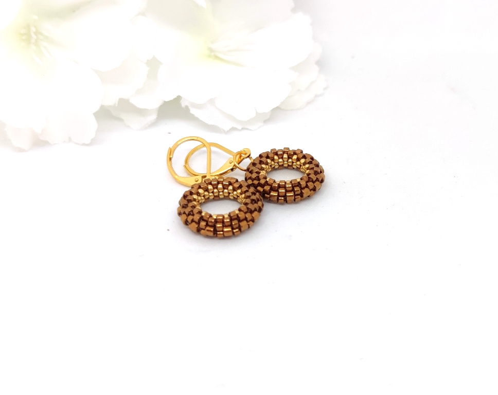 Small hoop earrings in bronz and gold colors