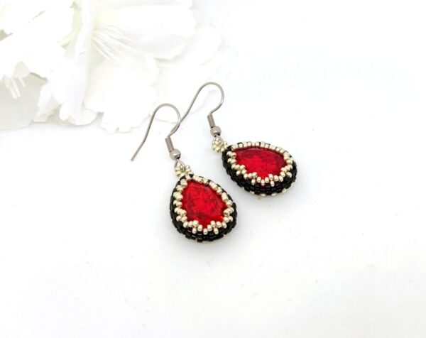 Crystaldrop beaded earrings in red color