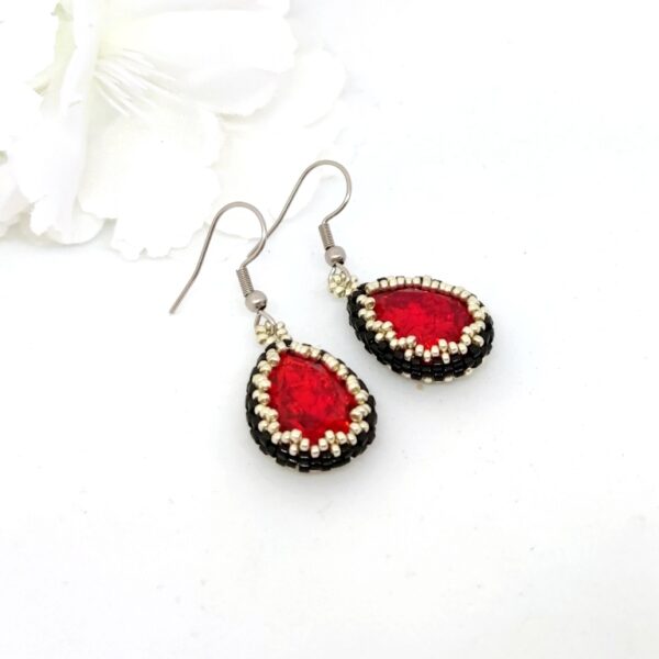 Crystaldrop beaded earrings in red color