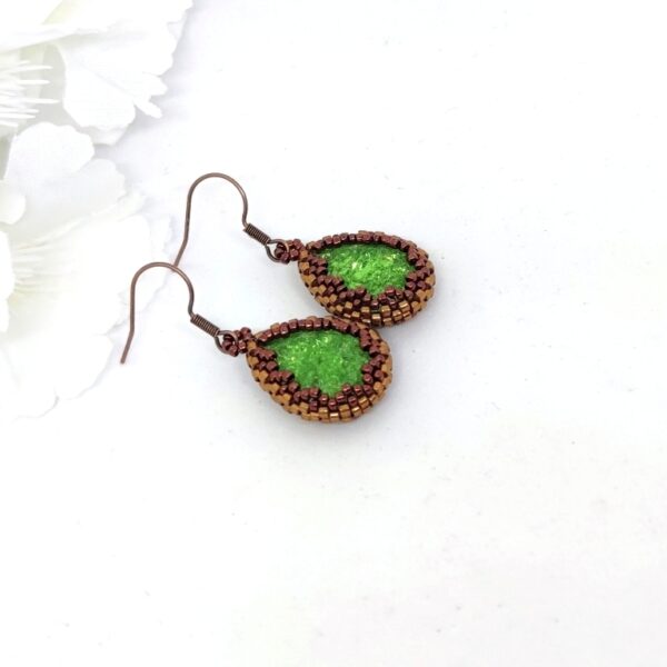 Crystaldrop beaded earrings in green color