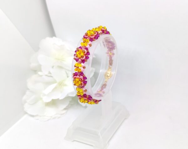 Bicone flower bracelet in pink-yellow colors