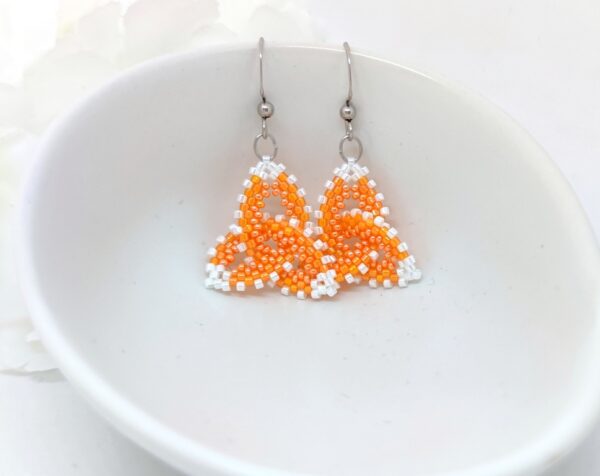 Celtic knot, beaded earrings in orange-white colors