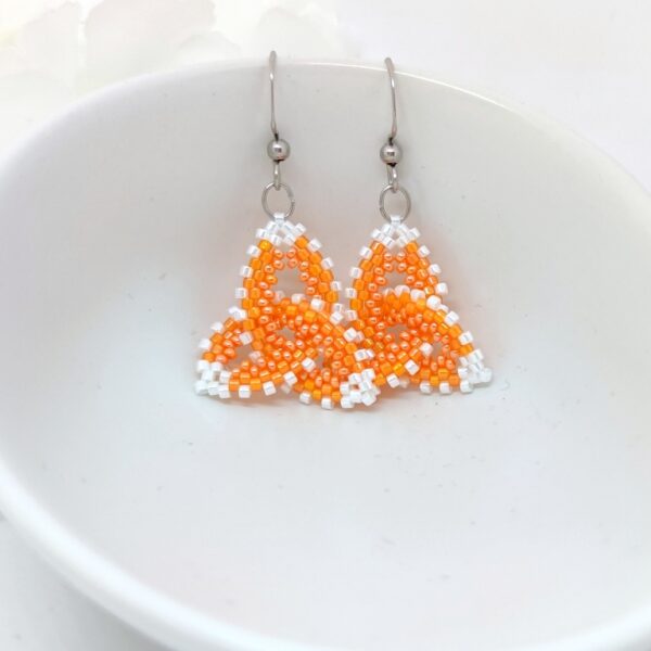 Celtic knot, beaded earrings in orange-white colors