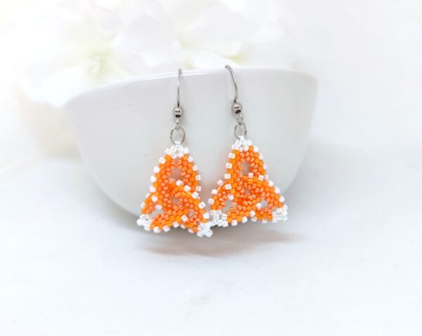 Celtic knot, beaded earrings in orange-white colors