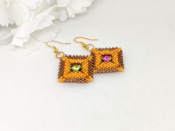 Pillow square, beaded earrings in bronze and orange colors