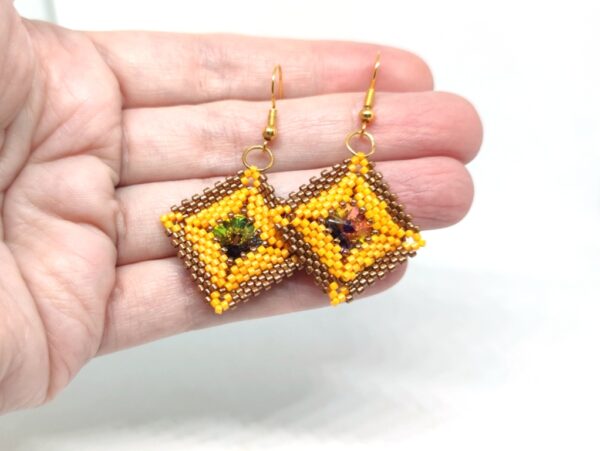 Pillow square, beaded earrings in bronze and orange colors