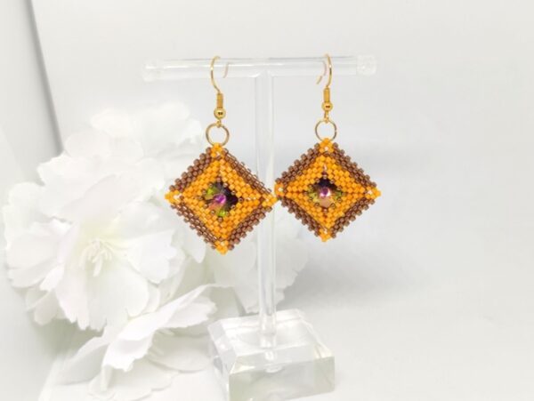 Pillow square, beaded earrings in bronze and orange colors