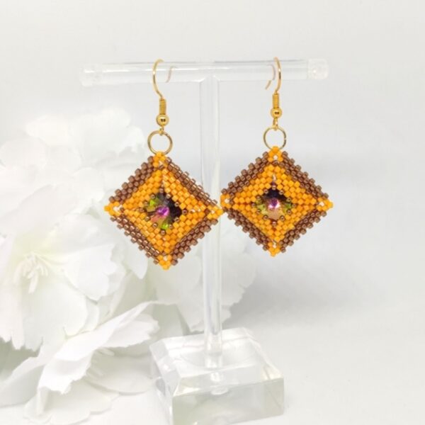 Pillow square, beaded earrings in bronze and orange colors