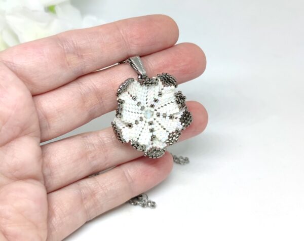 Marigold flower, beaded pendant in white color