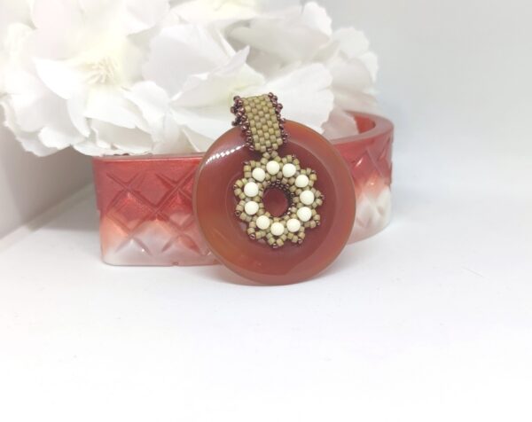 FidgetSpinner, beaded pendant in red agate donut