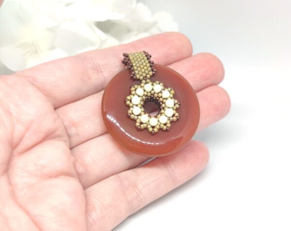 FidgetSpinner, beaded pendant in red agate donut