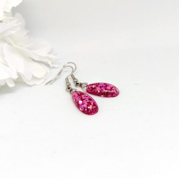 Resin drop earrings, with pink holographic chunky glitter