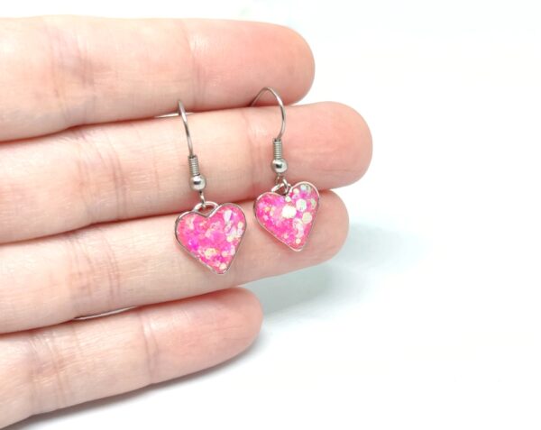 Heart earrings with pink, chunky glitter