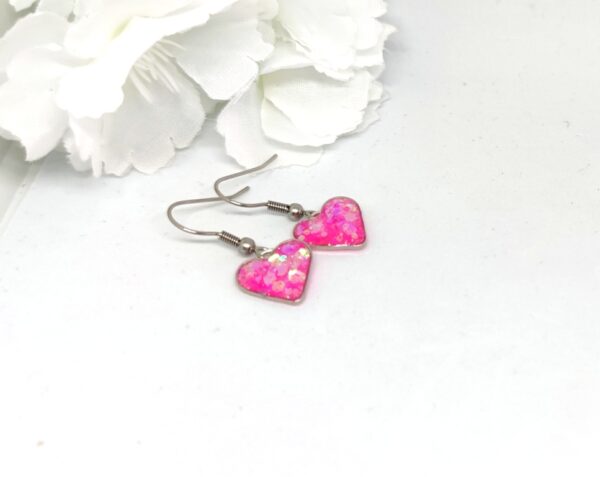 Heart earrings with pink, chunky glitter