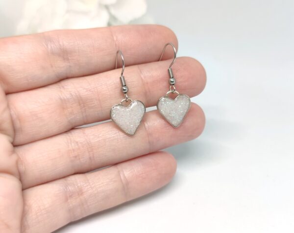 Heart earrings with white glitter