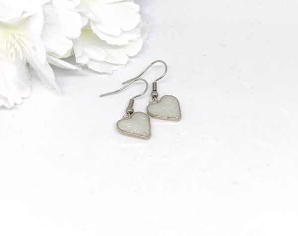 Heart earrings with white glitter