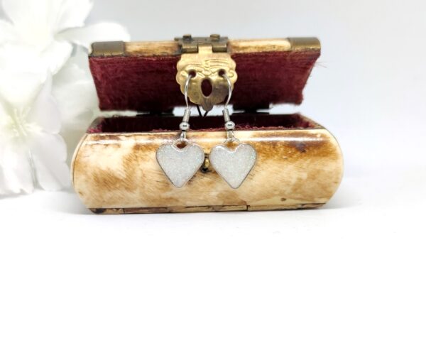 Heart earrings with white glitter
